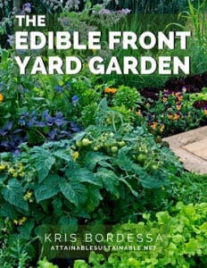 pretty garden with tomatoes and flowers - cover of book "edible front yard garden"