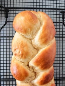 braided sweet bread on a cooling rack